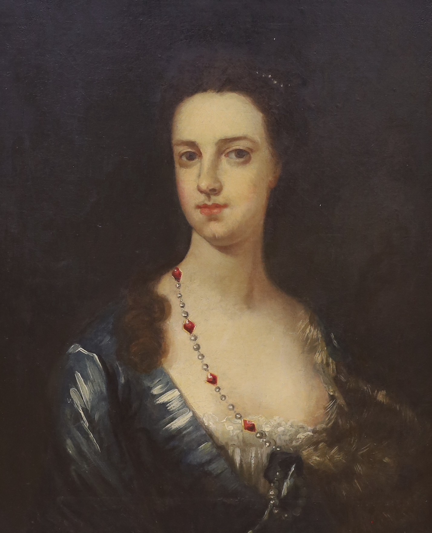 Follower of Sir Godfrey Kneller (1646-1723), oil on canvas, Portrait of a lady wearing a gem set necklace, 60 x 50cm